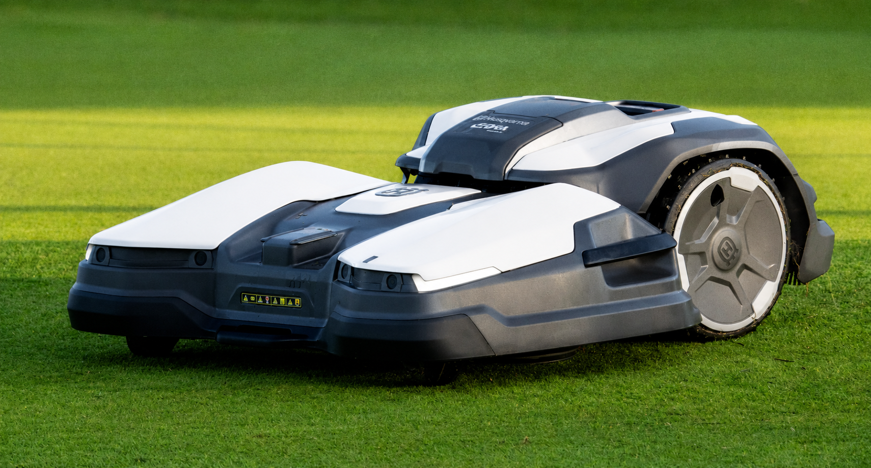 Autonomous robotic mower on a golf course fairway at Foxbridge Golf Club